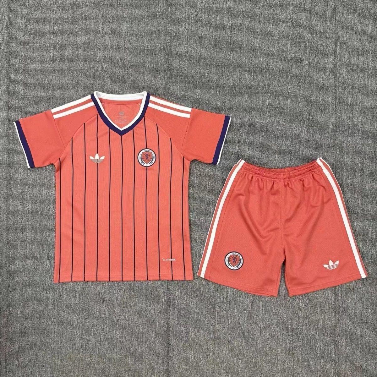 12771a42-7a0e-4450-8f35-084aa44cb303 26-27 World Cup Scotland away children's kit - Image 1