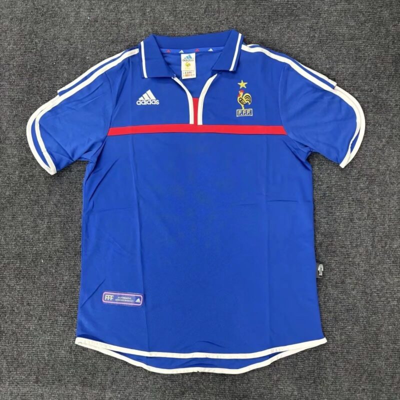 4dc679fc-8579-4552-86b5-6a6a7b8ffe47 2000 France home retro jersey - Image 1