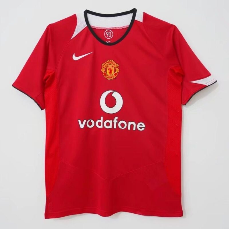 597d2293-610f-4f98-97bc-976c5f962d0e 2004-06 Manchester United home retro Champions League jersey - Image 1