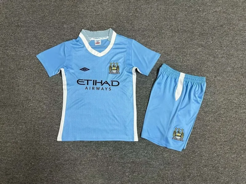 c7216ab3e1c69fec1ddf25ad2563ef26 2011/2012 Retro Manchester City Home kids kit jersey - Image 1