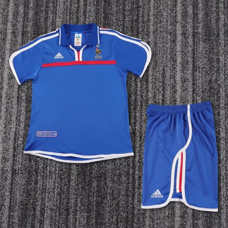 f6dbbbd797bcb20f77d7cab509c0e861 2000 Retro France Home kids kit jersey - Image 1
